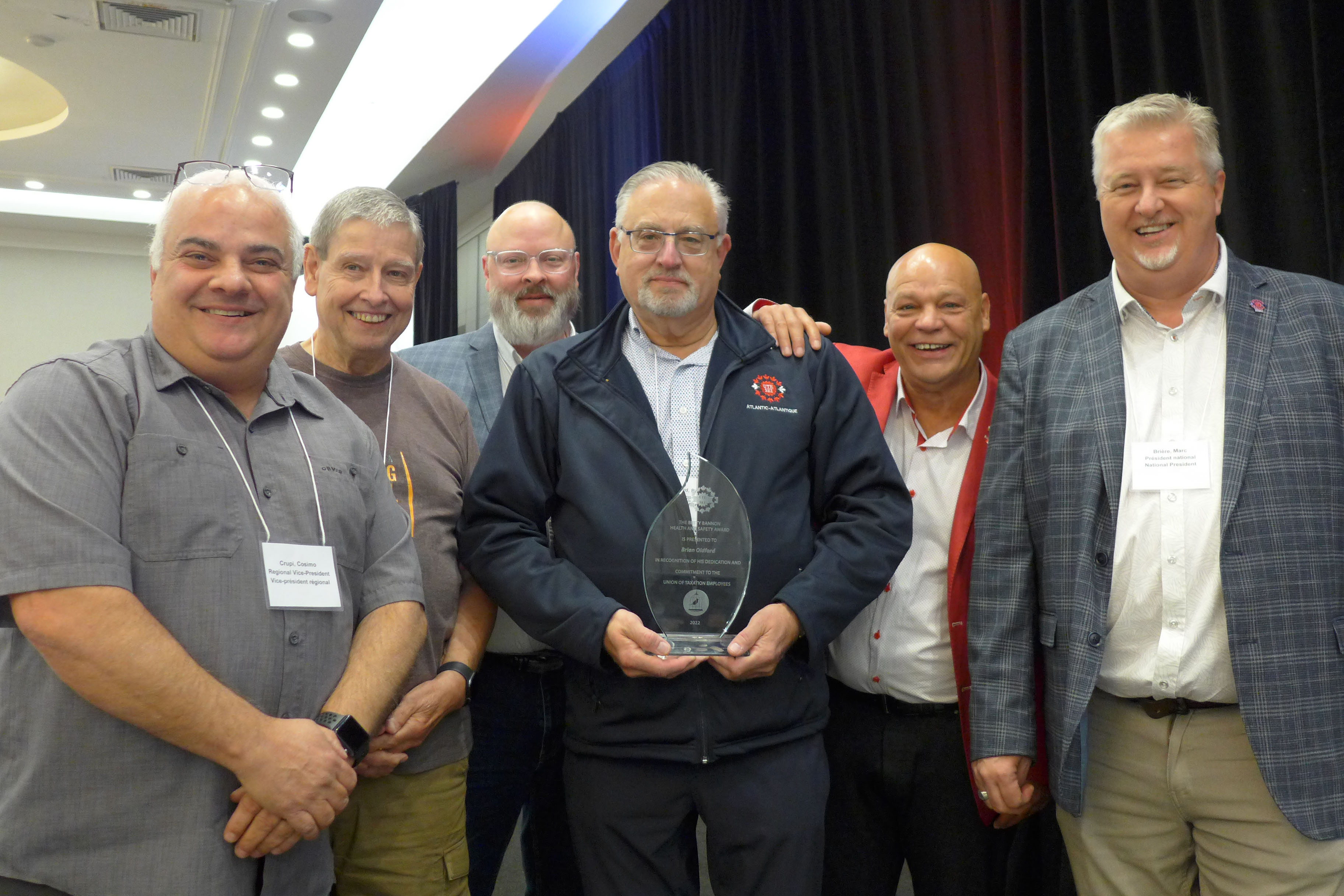 Brother Crupi presented the Award of Merit in the field of Health Safety Elizabeth Betty Bannon to Brother Brian Oldford, Atlantic Region RVP.