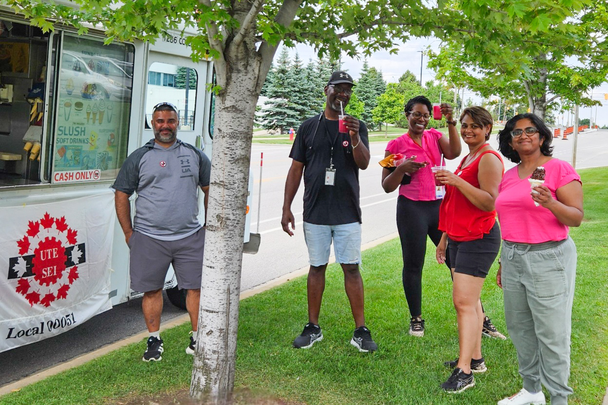 members in front of the ice cream truck
