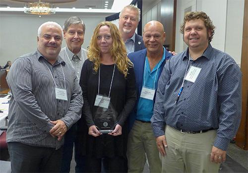 Dans la photo Cosimo Crupi, Gary Esslinger, Jennifer MacPherson, Marc Brière, Doug Gaetz, Ken Bye 