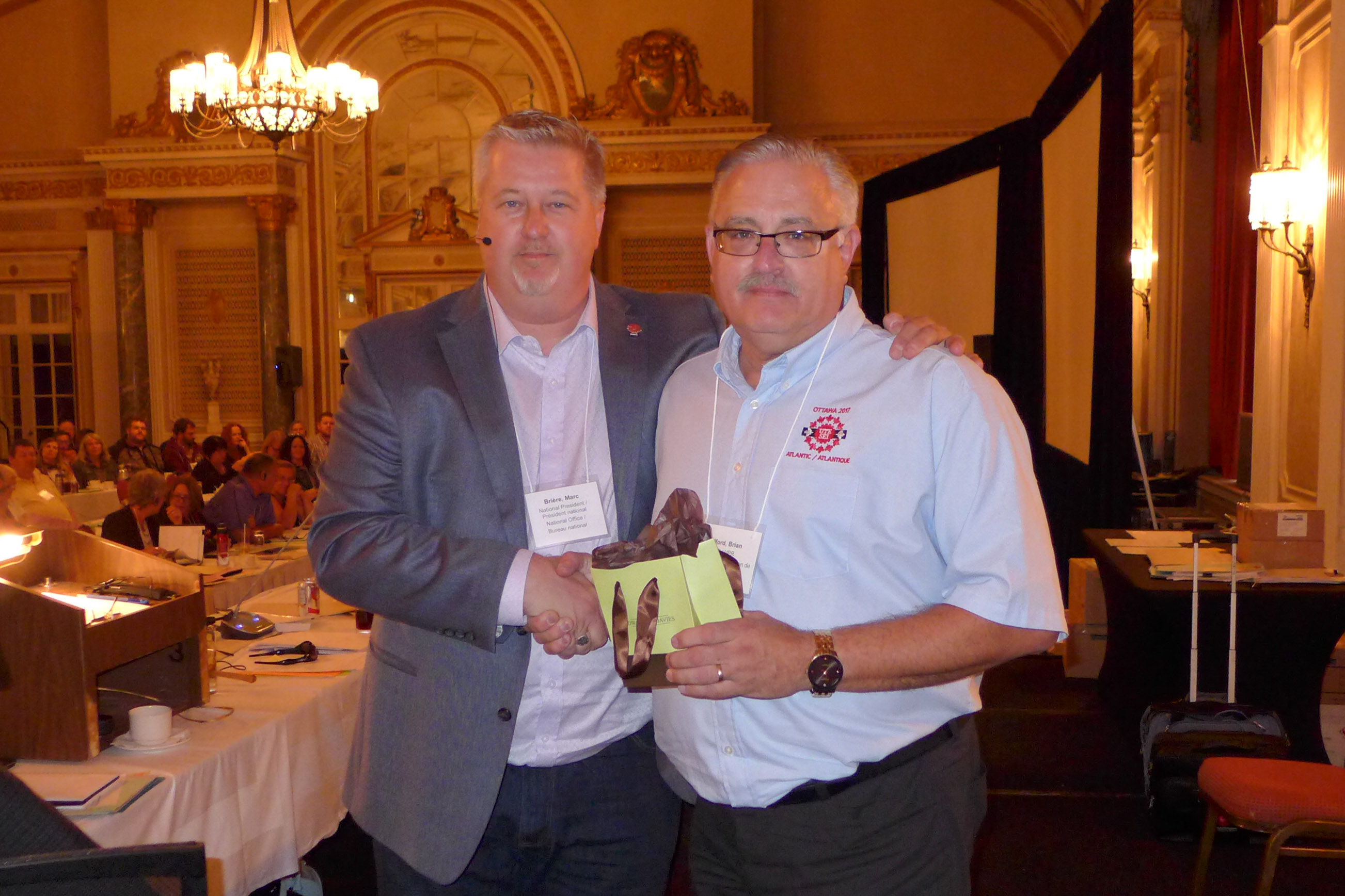 Marc Brière, National President awards a 30-year pin to Brian Oldford