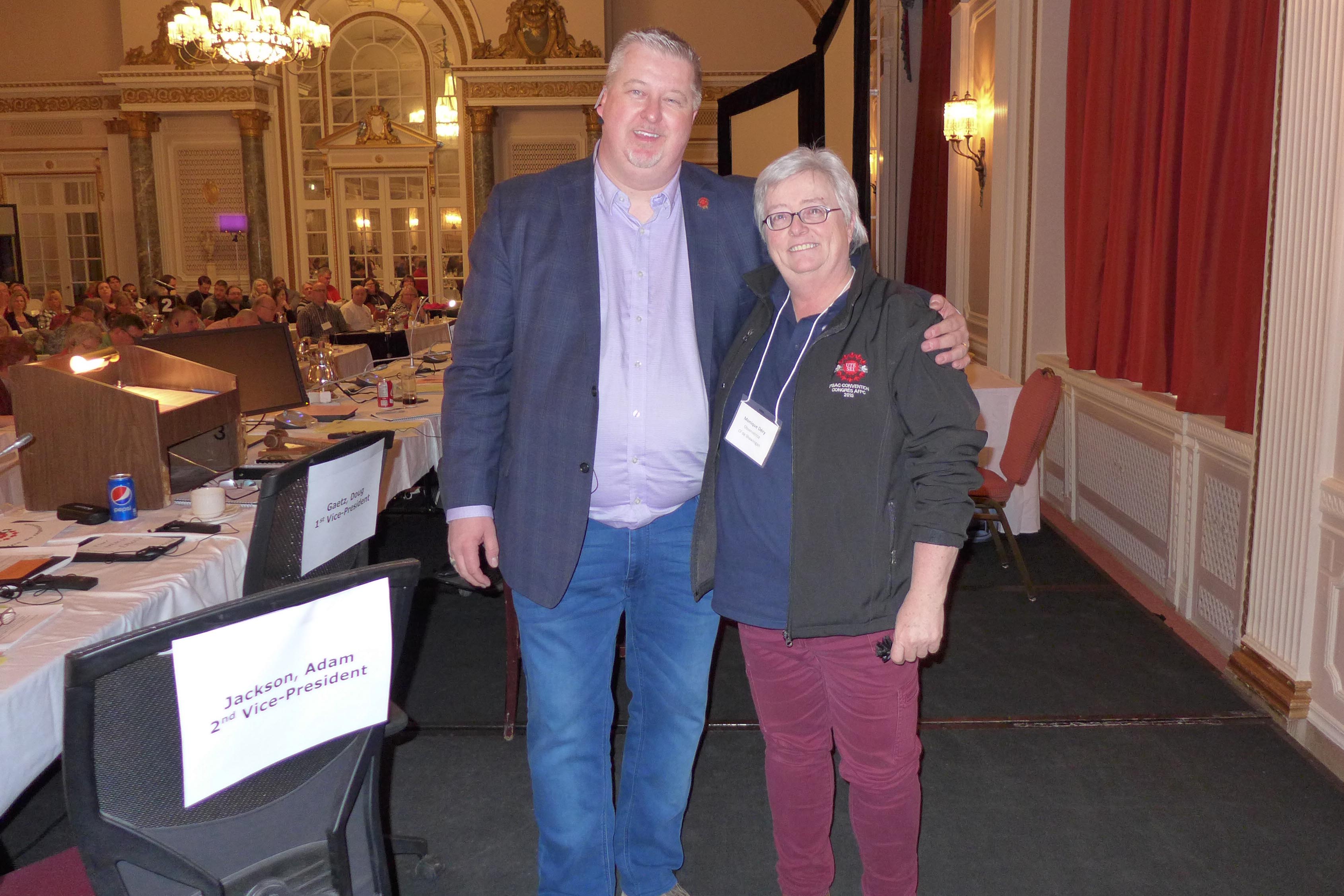 Marc Brière, National President presents Monique Déry with a service pin