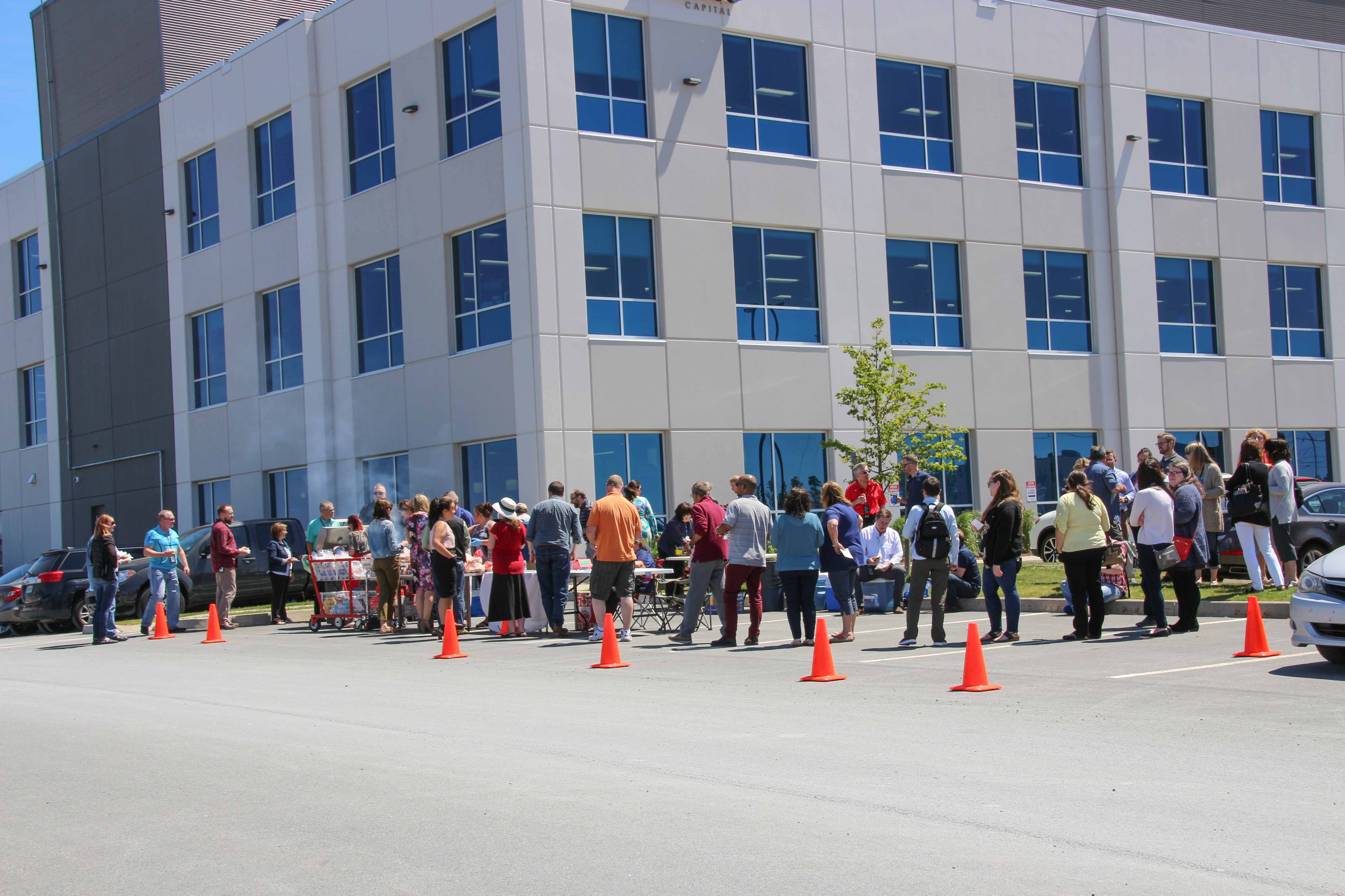 Members waiting to sign the flag, CAS card, and get their food