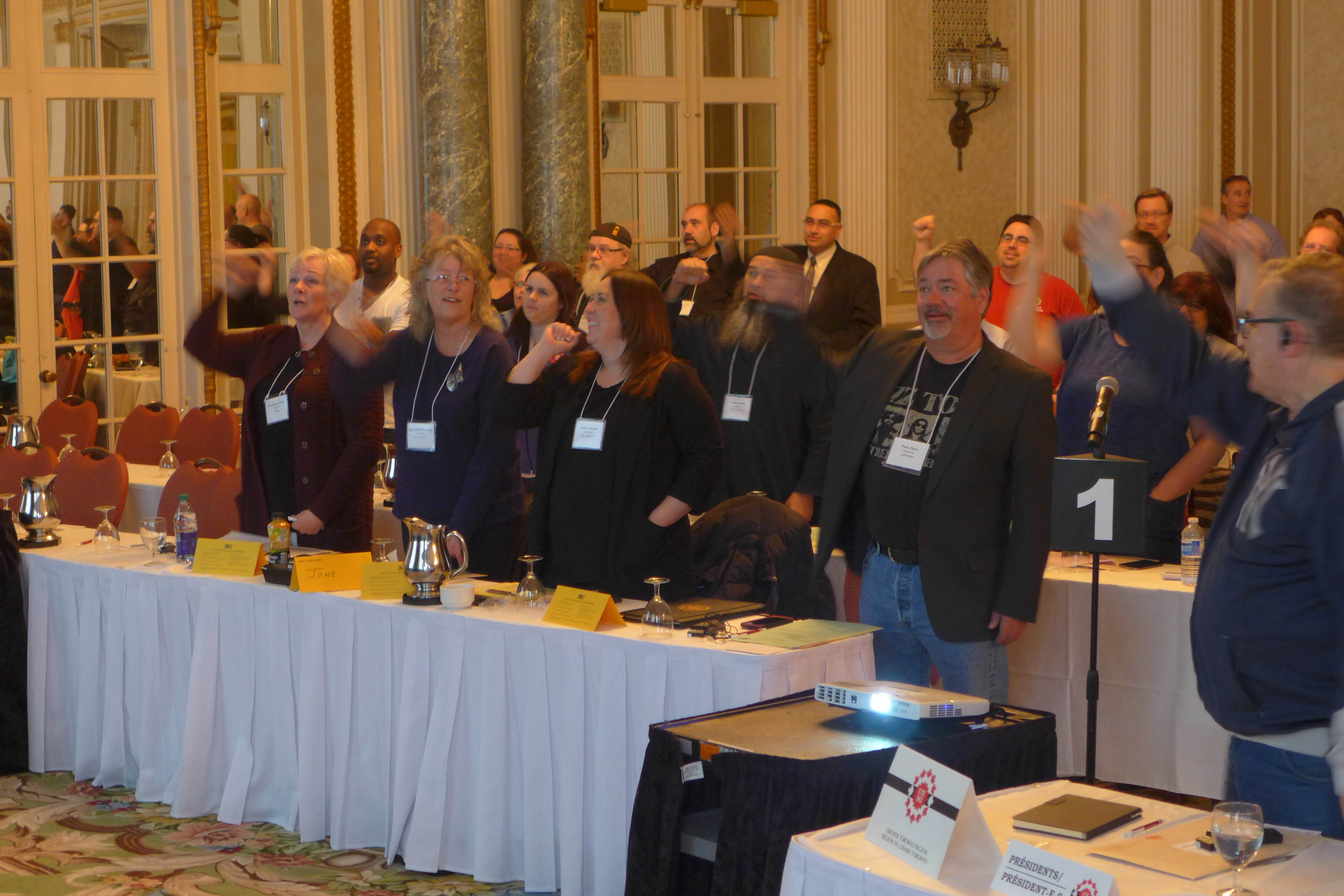Presidents and observers singing Solidarity Forever