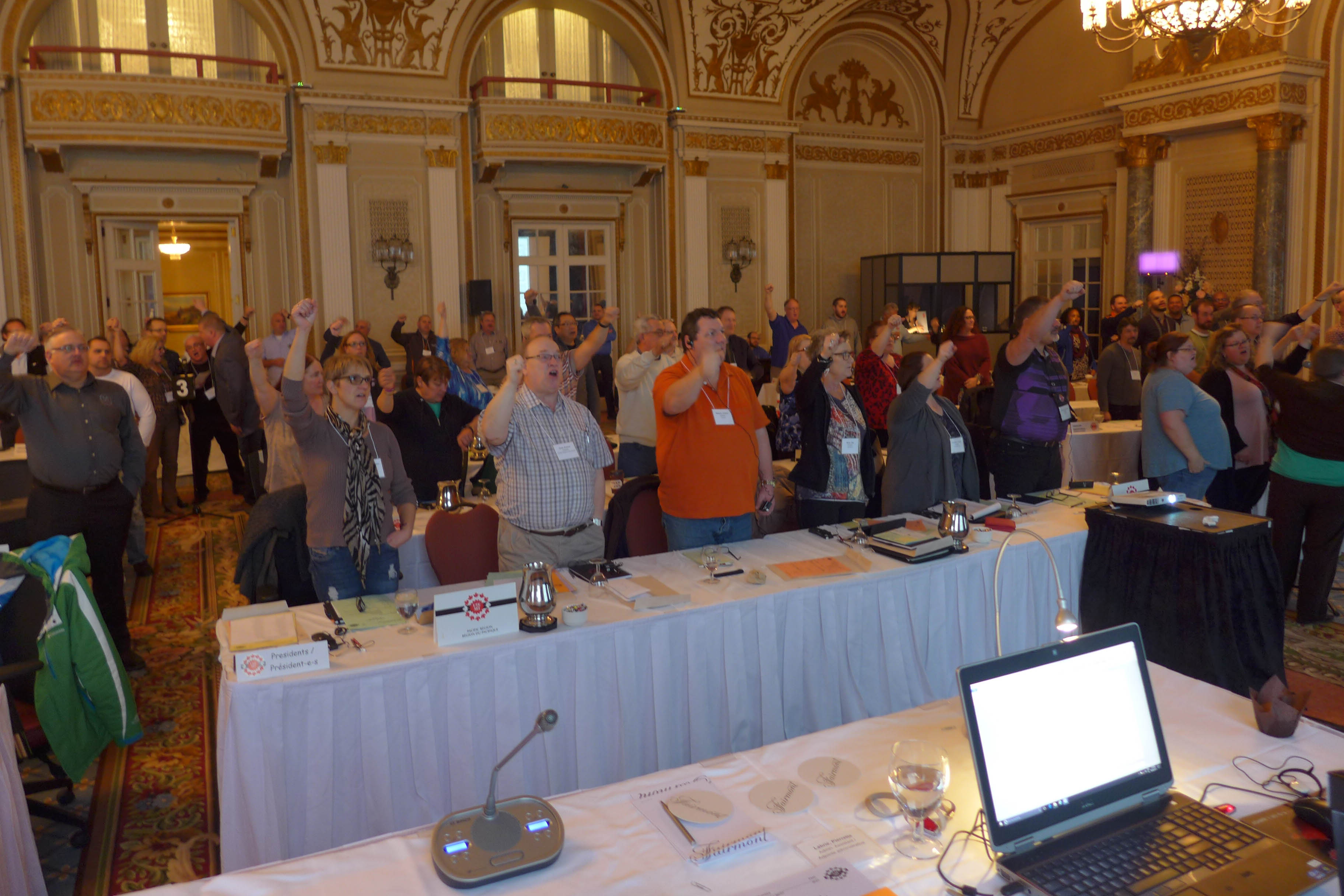 Presidents and observers singing Solidarity Forever