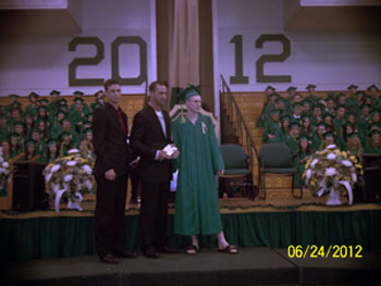 Mathieu's brothers, Marc and Eric with scholarship recipient Devon Atkinson