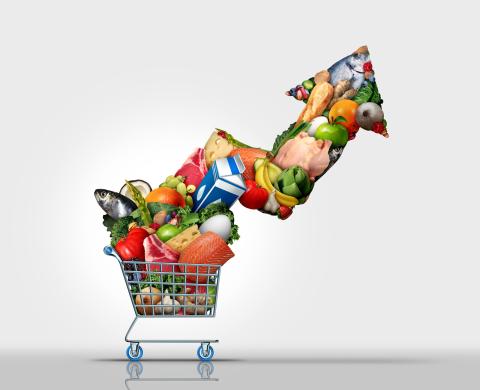 chariot d'épicerie avec une flèche vers le haut composé de produits alimentaires